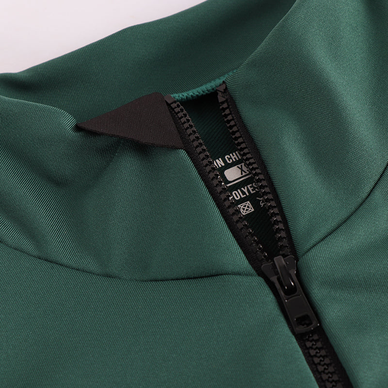High collar, black YKK zip on men's green long sleeve thermal jersey.