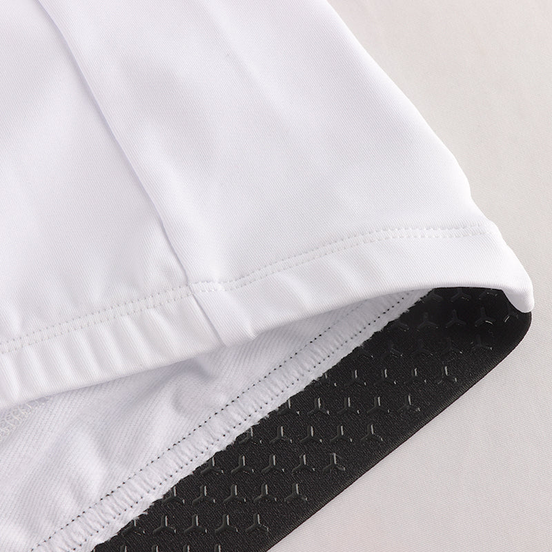 Men's white cycling long sleeve thermal jersey. Elastic grippers at the waist hem.