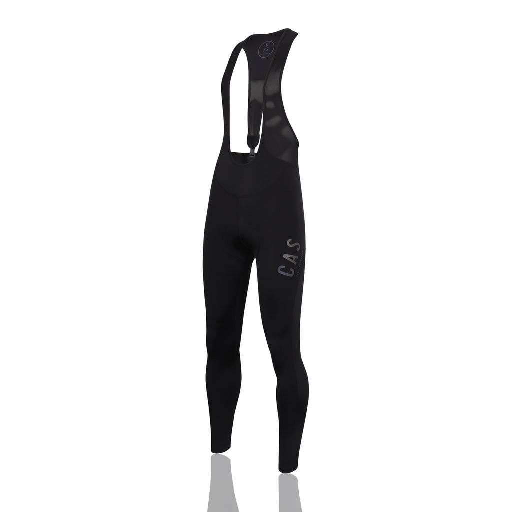 Men's black magnetic buckle bib leggings. CAS Feel the Freedom reflective logo. 